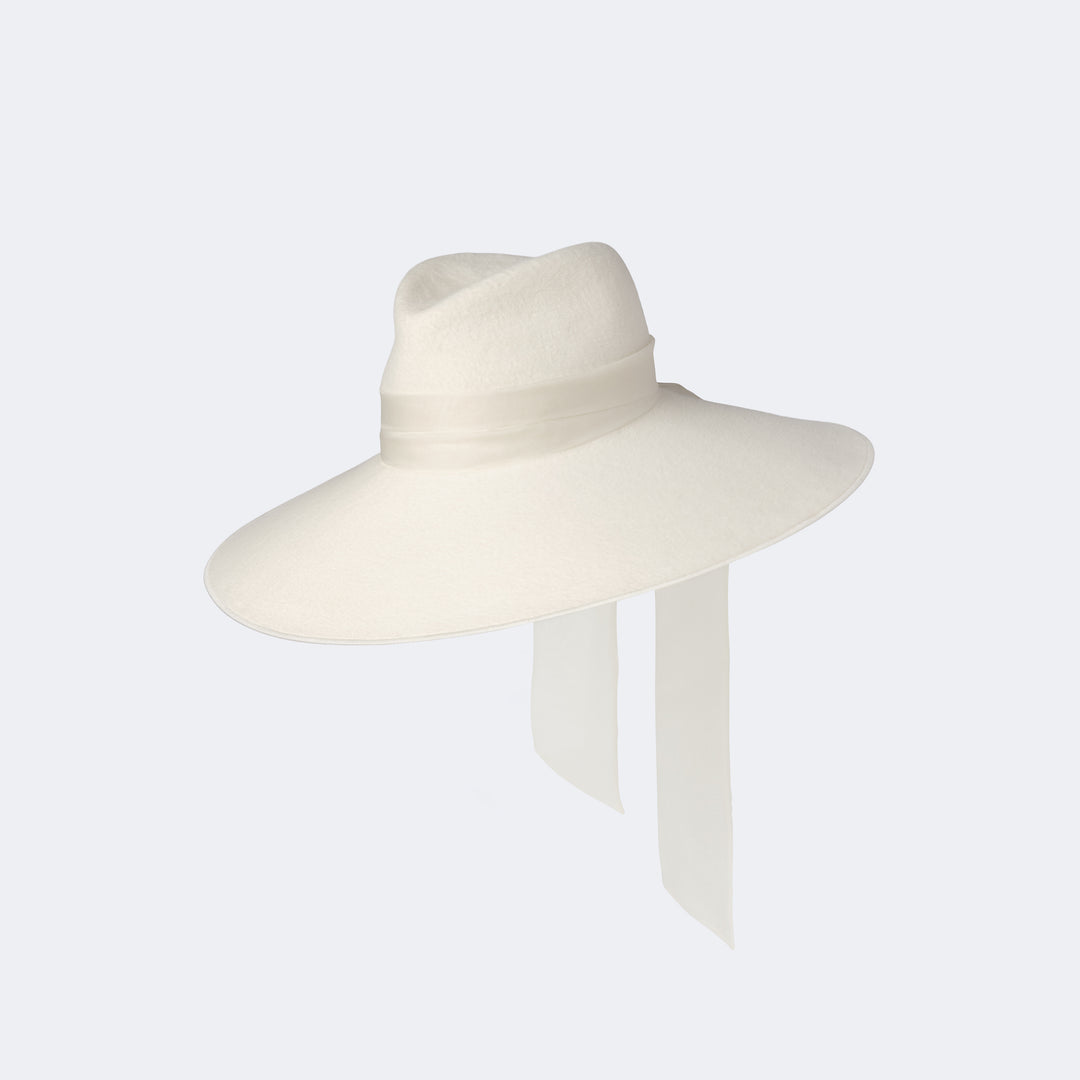 Ivory Bridal Phoenix Fedora with a hand sculpted crown, wide brim and long organza tails.