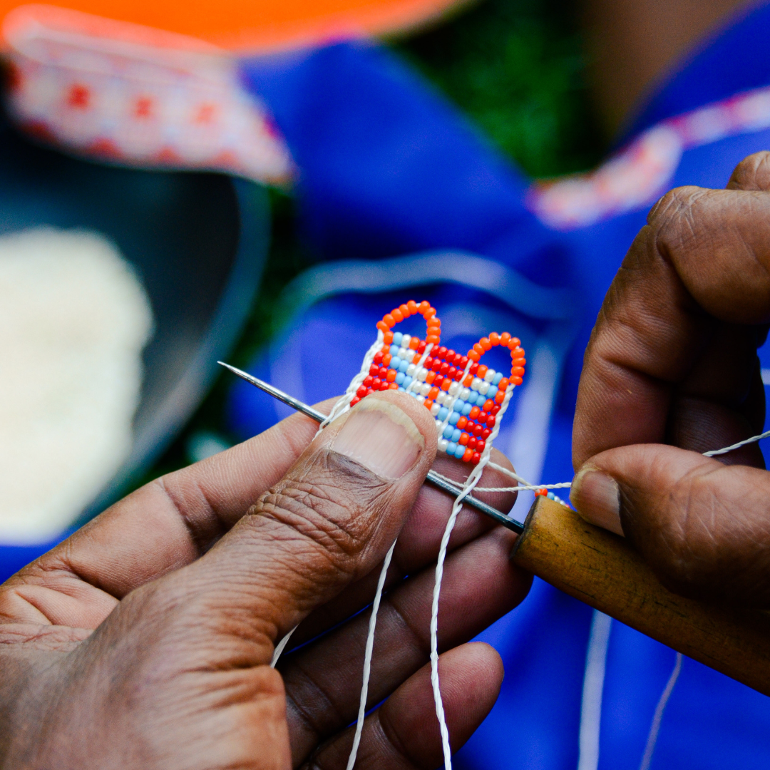Ivory World Traveller - Red Beaded Pendeza