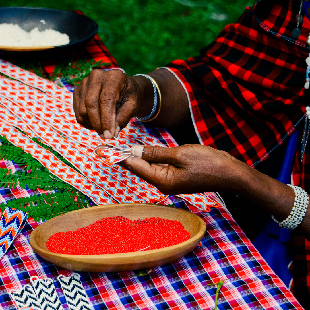 Ivory World Traveller - Red Beaded Pendeza